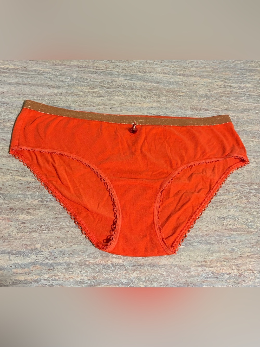 NWOT Victoria’s Secret Orange Hiphugger Panty with Gold Waistband